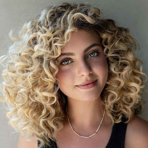 Why Voluminous and Short Layered Curly Haircuts Are Trending in 2024?