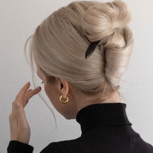 How Can I Achieve the Perfect French Bun Hairstyle?